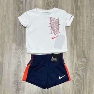 Nike White Tee and Navy Shorts with Coral Accents